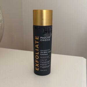 Paula's Choice Exfoliant in Black with Gold Text